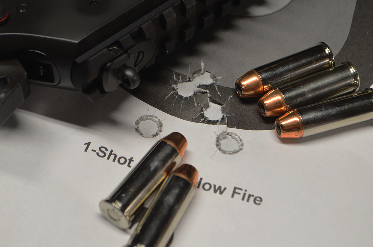 A five-shot group with factory iron sights at 35 yards, measures 1.25 inches. The ammunition is the now-discontinued SIG-Sauer 44 Magnum V-Crown 240-grain Jacketed Hollowpoint.